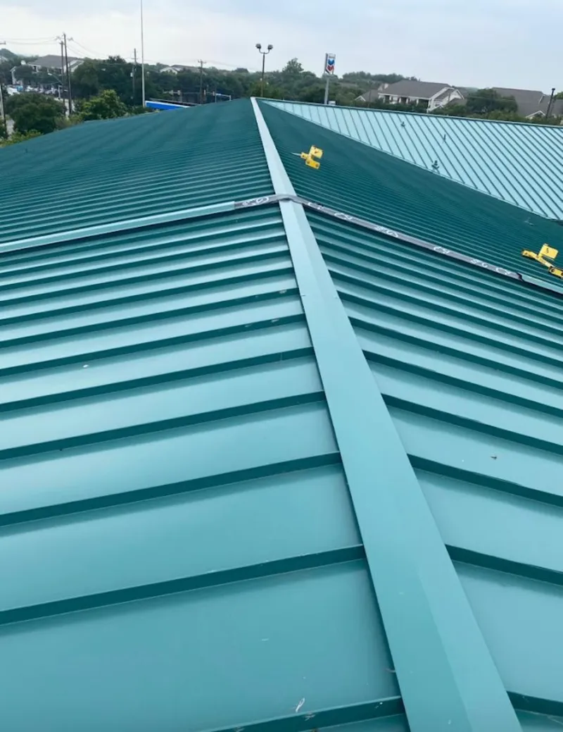 Green commercial metal roof ridge and valley for Metal Roof Repair in East End